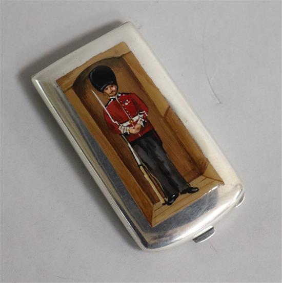 A George V silver cigarette case with later soft enamel panel of a guardsman, Deakin & Francis, Birmingham, 1922, 89mm.